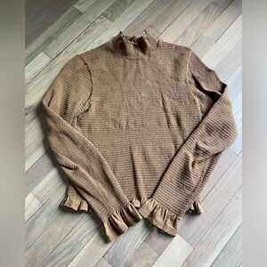 Turtle neck with ruffle detail